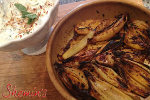 Spicy baked shallots with feta yoghurt sauce