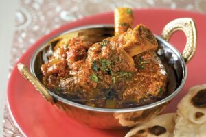 Lamb Shanks braised with onion and Garam Masala